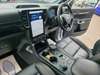 USED 2023 73 FORD RANGER 2.0 TD EcoBlue Wildtrak, 14.500 miles, Full Service Hist, 1 owner, Automatic, Sat Nav, Alloys  Rear camera, Leather Interior, Euro 6 ULEZ! +VAT @20%! This 2023 Ford Ranger TD Wildtrak presents an exceptional opportunity with its remarkably low mileage of just 14,500 miles and a single owner from new. This Four Wheel Drive pickup is powered by an efficient 2.0L Diesel engine, meeting Euro 6 emissions standards. It boasts a range of desirable features, including a heated steering wheel for those colder mornings, passive keyless entry and start for ultimate convenience, and advanced LED reflector headlights for superior visibility. The Technolog