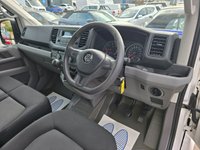 USED 2019 19 VOLKSWAGEN CRAFTER White 2.0 TDI CR35 Luton, 89,000 miles, 1 owner, Euro 6 ULEZ, 6-speed, Bluetooth, Electric Tail lift, Full Service History, great spec, + VAT @ 20%! This 2019 Volkswagen Crafter presents an exceptional ownership history, having been meticulously maintained by a single owner from new.  This 2.0 TDI CR35 Startline RWD LWB Euro 6 (s/s) 2dr model boasts a robust 2.0 litre diesel engine delivering a strong 138 bhp.  With a towing weight of 3000 kg and MOT valid until June 2026, it is ready for demanding tasks.  The Startline trim includes the Composition Audio system with Bluetooth connectivity, ensuring you stay connected on the go.  This Crafte