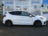 USED 2022 72 FORD FIESTA 1.5T EcoBoost ST-3 Hatchback 5dr Petrol Manual Euro 6 (s/s) (200 ps) Finished in FROZEN WHITE with contrasting EBONY SPORTS LEATHER ALCANTARA interior trim. It is impossible to ignore that this is one seriously fun car. If you are after some old-school hot hatch fun, the ST is hard to beat. Punching out 200 BHP faster than the old model. Features include SAT NAV, Rear View Camera, Cruise Control, Climate, Heated Seats, DAB, B/Tooth, LED day Lights, 2 Keys and much more. This Fiesta is a small car that you can really enjoy driving. Last Serviced at 30,023 miles.