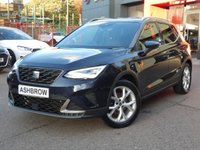 USED 2022 22 SEAT ARONA 1.0 TSI FR 5d DSG 110 S/S 1 OWNER FROM NEW, FULL SERVICE HISTORY, FULL LINK FOR APPLE CARPLAY / ANDROID AUTO (GIVES YOU SAT NAV), WIRELESS PHONE CHARGER, REAR PARKING SENSORS, LED LIGHTS, AUTO LIGHTS & WIPERS, ELECTRIC FOLDING DOOR MIRRORS, CRUISE CONTROL & SPEED LIMITER, LANE ASSIST, DAB RADIO, BLUETOOTH PHONE & MEDIA, DSG AUTOMATIC GEARBOX, TINTED GLASS, GREY CONTRAST ROOF, ROOF RAILS, 17 INCH ALLOY WHEELS, FRONT FOG LIGHTS, SPORT SEATS, LEATHER FLAT BOTTOM TIPTRONIC MULTIFUNCTION STEERING WHEEL