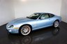 USED 2006 06 JAGUAR XKR 4.2 S XKR Coupe White Badge 2dr Petrol Automatic (304 g/km, 400 bhp)-This example is one of the very, very last. A 2006 model registered just before the new X150 XK appeared. It has been cossetted from new and used rarely, having amassed a mileage of just over 14000 miles in total. It is as close as you will find to a new one-Launched in 1996, the model was revised in 2002 with the original 4.0-litre V8 increased in size to 4.2-litres and the power upped from 370bhp to 400bhp-Finished in Frost Blue Metallic with Heated magnolia leather sports seats.20-inch BBS split-rim alloys-This is the full-fat real deal, a genuine XKR, with the later and more powerful supercharged 4.2-litre V8 kicking out 400bhp. It runs sweetly and sounds incredible, the sharp whistle of the supercharger accompanying the eager rush of acceleration between each gear. It really is a fast and responsive car, yet despite the incredible performance on offer it still retains Jaguars traditionally cossetting ride 
