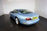 USED 2006 06 JAGUAR XKR 4.2 S XKR Coupe White Badge 2dr Petrol Automatic (304 g/km, 400 bhp)-This example is one of the very, very last. A 2006 model registered just before the new X150 XK appeared. It has been cossetted from new and used rarely, having amassed a mileage of just over 14000 miles in total. It is as close as you will find to a new one-Launched in 1996, the model was revised in 2002 with the original 4.0-litre V8 increased in size to 4.2-litres and the power upped from 370bhp to 400bhp-Finished in Frost Blue Metallic with Heated magnolia leather sports seats.20-inch BBS split-rim alloys-This is the full-fat real deal, a genuine XKR, with the later and more powerful supercharged 4.2-litre V8 kicking out 400bhp. It runs sweetly and sounds incredible, the sharp whistle of the supercharger accompanying the eager rush of acceleration between each gear. It really is a fast and responsive car, yet despite the incredible performance on offer it still retains Jaguars traditionally cossetting ride 