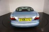 USED 2006 06 JAGUAR XKR 4.2 S XKR Coupe White Badge 2dr Petrol Automatic (304 g/km, 400 bhp)-This example is one of the very, very last. A 2006 model registered just before the new X150 XK appeared. It has been cossetted from new and used rarely, having amassed a mileage of just over 14000 miles in total. It is as close as you will find to a new one-Launched in 1996, the model was revised in 2002 with the original 4.0-litre V8 increased in size to 4.2-litres and the power upped from 370bhp to 400bhp-Finished in Frost Blue Metallic with Heated magnolia leather sports seats.20-inch BBS split-rim alloys-This is the full-fat real deal, a genuine XKR, with the later and more powerful supercharged 4.2-litre V8 kicking out 400bhp. It runs sweetly and sounds incredible, the sharp whistle of the supercharger accompanying the eager rush of acceleration between each gear. It really is a fast and responsive car, yet despite the incredible performance on offer it still retains Jaguars traditionally cossetting ride 