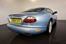 USED 2006 06 JAGUAR XKR 4.2 S XKR Coupe White Badge 2dr Petrol Automatic (304 g/km, 400 bhp)-This example is one of the very, very last. A 2006 model registered just before the new X150 XK appeared. It has been cossetted from new and used rarely, having amassed a mileage of just over 14000 miles in total. It is as close as you will find to a new one-Launched in 1996, the model was revised in 2002 with the original 4.0-litre V8 increased in size to 4.2-litres and the power upped from 370bhp to 400bhp-Finished in Frost Blue Metallic with Heated magnolia leather sports seats.20-inch BBS split-rim alloys-This is the full-fat real deal, a genuine XKR, with the later and more powerful supercharged 4.2-litre V8 kicking out 400bhp. It runs sweetly and sounds incredible, the sharp whistle of the supercharger accompanying the eager rush of acceleration between each gear. It really is a fast and responsive car, yet despite the incredible performance on offer it still retains Jaguars traditionally cossetting ride 