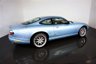 USED 2006 06 JAGUAR XKR 4.2 S XKR Coupe White Badge 2dr Petrol Automatic (304 g/km, 400 bhp)-This example is one of the very, very last. A 2006 model registered just before the new X150 XK appeared. It has been cossetted from new and used rarely, having amassed a mileage of just over 14000 miles in total. It is as close as you will find to a new one-Launched in 1996, the model was revised in 2002 with the original 4.0-litre V8 increased in size to 4.2-litres and the power upped from 370bhp to 400bhp-Finished in Frost Blue Metallic with Heated magnolia leather sports seats.20-inch BBS split-rim alloys-This is the full-fat real deal, a genuine XKR, with the later and more powerful supercharged 4.2-litre V8 kicking out 400bhp. It runs sweetly and sounds incredible, the sharp whistle of the supercharger accompanying the eager rush of acceleration between each gear. It really is a fast and responsive car, yet despite the incredible performance on offer it still retains Jaguars traditionally cossetting ride 