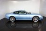 USED 2006 06 JAGUAR XKR 4.2 S XKR Coupe White Badge 2dr Petrol Automatic (304 g/km, 400 bhp)-This example is one of the very, very last. A 2006 model registered just before the new X150 XK appeared. It has been cossetted from new and used rarely, having amassed a mileage of just over 14000 miles in total. It is as close as you will find to a new one-Launched in 1996, the model was revised in 2002 with the original 4.0-litre V8 increased in size to 4.2-litres and the power upped from 370bhp to 400bhp-Finished in Frost Blue Metallic with Heated magnolia leather sports seats.20-inch BBS split-rim alloys-This is the full-fat real deal, a genuine XKR, with the later and more powerful supercharged 4.2-litre V8 kicking out 400bhp. It runs sweetly and sounds incredible, the sharp whistle of the supercharger accompanying the eager rush of acceleration between each gear. It really is a fast and responsive car, yet despite the incredible performance on offer it still retains Jaguars traditionally cossetting ride 