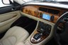 USED 2006 06 JAGUAR XKR 4.2 S XKR Coupe White Badge 2dr Petrol Automatic (304 g/km, 400 bhp)-This example is one of the very, very last. A 2006 model registered just before the new X150 XK appeared. It has been cossetted from new and used rarely, having amassed a mileage of just over 14000 miles in total. It is as close as you will find to a new one-Launched in 1996, the model was revised in 2002 with the original 4.0-litre V8 increased in size to 4.2-litres and the power upped from 370bhp to 400bhp-Finished in Frost Blue Metallic with Heated magnolia leather sports seats.20-inch BBS split-rim alloys-This is the full-fat real deal, a genuine XKR, with the later and more powerful supercharged 4.2-litre V8 kicking out 400bhp. It runs sweetly and sounds incredible, the sharp whistle of the supercharger accompanying the eager rush of acceleration between each gear. It really is a fast and responsive car, yet despite the incredible performance on offer it still retains Jaguars traditionally cossetting ride 