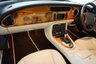 USED 2006 06 JAGUAR XKR 4.2 S XKR Coupe White Badge 2dr Petrol Automatic (304 g/km, 400 bhp)-This example is one of the very, very last. A 2006 model registered just before the new X150 XK appeared. It has been cossetted from new and used rarely, having amassed a mileage of just over 14000 miles in total. It is as close as you will find to a new one-Launched in 1996, the model was revised in 2002 with the original 4.0-litre V8 increased in size to 4.2-litres and the power upped from 370bhp to 400bhp-Finished in Frost Blue Metallic with Heated magnolia leather sports seats.20-inch BBS split-rim alloys-This is the full-fat real deal, a genuine XKR, with the later and more powerful supercharged 4.2-litre V8 kicking out 400bhp. It runs sweetly and sounds incredible, the sharp whistle of the supercharger accompanying the eager rush of acceleration between each gear. It really is a fast and responsive car, yet despite the incredible performance on offer it still retains Jaguars traditionally cossetting ride 