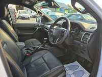 USED 2019 69 FORD RANGER 2.0 EcoBlue Wildtrak Pickup, 1 owner, 7 services, Timing Belt Feb 25, Euro 6 ULEZ, automatic, A/C, heated leather, sat nav, rear camera, + VAT @ 20%. This 2019 Ford Ranger Wildtrak is a robust and capable vehicle, ready for any challenge. Powered by a 2.0L diesel engine and featuring Four Wheel Drive,with a full service history with a cam belt change in jan 25.This Euro 6 compliant model comes equipped with Bi-Xenon headlights for excellent visibility, Traction Control and Electronic Stability Control for enhanced safety, and a leather wrapped steering wheel for a comfortable driving experience. Rear parking sensors are also included to assis