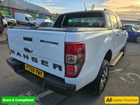 USED 2019 69 FORD RANGER 2.0 EcoBlue Wildtrak Pickup, 1 owner, 7 services, Timing Belt Feb 25, Euro 6 ULEZ, automatic, A/C, heated leather, sat nav, rear camera, + VAT @ 20%. This 2019 Ford Ranger Wildtrak is a robust and capable vehicle, ready for any challenge. Powered by a 2.0L diesel engine and featuring Four Wheel Drive,with a full service history with a cam belt change in jan 25.This Euro 6 compliant model comes equipped with Bi-Xenon headlights for excellent visibility, Traction Control and Electronic Stability Control for enhanced safety, and a leather wrapped steering wheel for a comfortable driving experience. Rear parking sensors are also included to assis