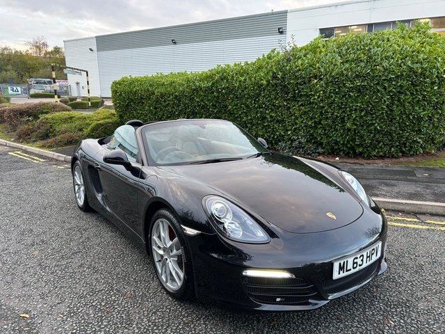 2013 63 Porsche Boxster 2.7 981 Convertible 2dr Petrol PDK Euro 5 (s/s) (265 ps)-Last Of The Naturally Aspirated Engines-Factory Extras Worth &pound;4,625-Superb Low Mileage Example-Finished In Basalt Black Metallic-Heated Black Leather Upholstery-19 Inch Boxster S Alloy Wheels-Cruise Control-Climate Control-Sound Package Plus-Wind Deflector-Top Tinted Windscreen-Bluetooth-Front & Rear Park Assist-Sport Design Steering Wheel-Isofix Child Seat Mounting Points On Passenger Seat-Porsche Crest Embossed On Head Rests-The One To Have.