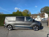 USED 2026 26 FORD TRANSIT CUSTOM 320 SPORT L2 DCIV 5 SEAT CREW VAN 2.5 PHEV HYBRID AUTOMATIC 236 BHP ** 5 YEAR 120,000 MILE FORD WARRANTY ** Brand New *Unregistered* Desirable  (171kw) Petrol Plug-In Hybrid With Every Extra Inc 13" Touchscreen Stereo With Apple Carplay + Android Auto, Dual Zone Automatic Air Conditioning, Seat Pack 19, 19" Polished Alloy Wheels & Lots More!! Finished In Stunning Magnetic Grey & Comes With 5 Year 120,000 Mile Ford Warranty For Peace Of Mind
