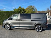 USED 2026 26 FORD TRANSIT CUSTOM 320 SPORT L2 DCIV 5 SEAT CREW VAN 2.5 PHEV HYBRID AUTOMATIC 236 BHP ** 5 YEAR 120,000 MILE FORD WARRANTY ** Brand New *Unregistered* Desirable  (171kw) Petrol Plug-In Hybrid With Every Extra Inc 13" Touchscreen Stereo With Apple Carplay + Android Auto, Dual Zone Automatic Air Conditioning, Seat Pack 19, 19" Polished Alloy Wheels & Lots More!! Finished In Stunning Magnetic Grey & Comes With 5 Year 120,000 Mile Ford Warranty For Peace Of Mind