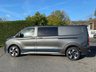 USED 2026 26 FORD TRANSIT CUSTOM 320 SPORT L2 DCIV 5 SEAT CREW VAN 2.5 PHEV HYBRID AUTOMATIC 236 BHP ** 5 YEAR 120,000 MILE FORD WARRANTY ** Brand New *Unregistered* Desirable  (171kw) Petrol Plug-In Hybrid With Every Extra Inc 13" Touchscreen Stereo With Apple Carplay + Android Auto, Dual Zone Automatic Air Conditioning, Seat Pack 19, 19" Polished Alloy Wheels & Lots More!! Finished In Stunning Magnetic Grey & Comes With 5 Year 120,000 Mile Ford Warranty For Peace Of Mind