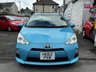 USED 2012 TOYOTA AQUA 1.5 Automatic Petrol Hybrid Hatchback Blue 5dr JAPANESE IMPORTED TOYOTA AQUA/ PRIUS CITY + LOW MILEAGE 1.5 HYBRID + CLEAN CONDITION THROUGHOUT + CHEAP/ ECO + LONG MOT/ FRESH SERVICE + FINISHED IN METALLIC LIGHT BLUE + SPEC INCLUDES WHITE AND BLACK CLOTH INTERIOR, ELECTRIC MIRRORS, FOLDING DOOR MIRRORS, PRIVACY GLASS, A/C, WHEEL TRIMS, REMOTE LOCKING + 3 MONTHS WARRANTY + 12 MONTHS AA BREAKDOWN COVER INCLUDED
