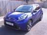 USED 2022 22 TOYOTA AYGO X 1.0 VVT-i Edge Hatchback 5dr Petrol Manual Euro 6 (s/s) (72 ps) WITH ONLY 8,500 MILES FROM NEW, THIS AYGO X IS IN SUPERB CONDITION WITH ALLOYS, APPLE CARPLAY, CRUISE a& CLIMATE CONTROL.