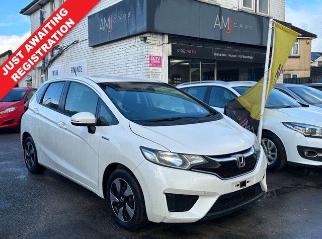 2016 fit 1.5 hybrid petrol automatic pearl white 5dr japanese imported hybrid  fit + clean condition throughout + fresh service... photo