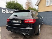 USED 2018 18 MERCEDES-BENZ C-CLASS 2.1 C220d AMG Line Estate 5dr Diesel G-Tronic+ Euro 6 (s/s) (170 ps) Dual zone climate control A/C, Black leather interior, Satellite navigation, Cruise control, Bluetooth, Voice control, USB input, Heated front seats, Paddleshift gears, Dynamic drive modes, Powered tailgate, Auto dimming rearview mirror, DAB radio, LED daytime running lights, Rear parking camera, Front & Rear parking sensors, Auto xenon headlights.