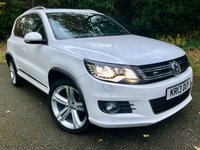 USED 2013 13 VOLKSWAGEN TIGUAN 2.0 TDI BlueMotion Tech R-Line SUV 5dr Diesel Manual 4WD Euro 5 (s/s) (170 ps) 1 LADY OWNER FROM 2 MONTHS OLD//X12 MAIN DEALER/SPECIALIST SERVICE STAMPS//OPTICAL PARK ASSIST SYSTEM//PANORAMIC GLASS ROOF//HEATED BLACK LEATHER SPORTS SEATING\\BEAUTIFULLY KEPT CAR THROUGHOUT\\\\\\\\\PRICE NOW INCLUDES NEW CAMBELT+WATERPUMP+NEW MOT///////// 4WD Euro 5 (s/s) (170 ps) 1 LADY OWNER FROM 2 MONTHS OLD//X12 MAIN DEALER/SPECIALIST SERVICE STAMPS//OPTICAL PARK ASSIST SYSTEM//PANORAMIC GLASS ROOF//HEATED BLACK LEATHER SPORTS SEATINGBEAUTIFULLY KEPT CAR THROUGHOUT\\\\PRICE NOW INCLUDES NEW CAMBELT+WATERPUMP+NEW MOT/////////