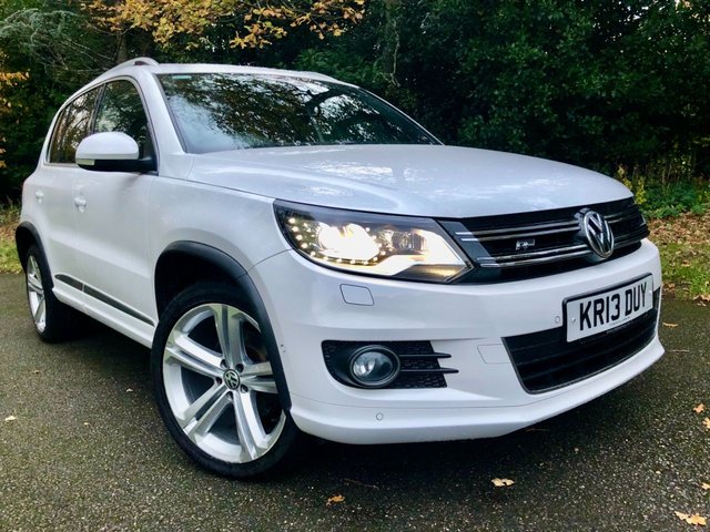 2013 13 Volkswagen Tiguan 2.0 TDI BlueMotion Tech R-Line SUV 5dr Diesel Manual 4WD Euro 5 (s/s) (170 ps) 1 LADY OWNER FROM 2 MONTHS OLD//X12 MAIN DEALER/SPECIALIST SERVICE STAMPS//OPTICAL PARK ASSIST SYSTEM//PANORAMIC GLASS ROOF//HEATED BLACK LEATHER SPORTS SEATING\\BEAUTIFULLY KEPT CAR THROUGHOUT\\\\\\\\\PRICE NOW INCLUDES NEW CAMBELT+WATERPUMP+NEW MOT/////////