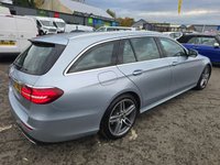USED 2018 67 MERCEDES-BENZ E-CLASS Silver 2.0 E220d AMG Line Estate, 56,300 miles, 2 owners, Euro 6 ULEZ, Automatic, Bluetooth, Heated Half leather, Sat Nav, Cruise Control, FSH. This 2018 Mercedes Benz E Class E220d AMG Line presents an exceptional opportunity with its remarkably low mileage of just 56,300 miles for its age. This Euro 6 compliant model boasts a powerful yet efficient 2.0 litre diesel engine, delivering an impressive 0-60mph acceleration in only 7.7 seconds. The AMG Line trim ensures a sporty aesthetic and enhanced driving experience, complemented by a generously sized boot, offering practicality for all your needs.  The performance figures for this E Cl