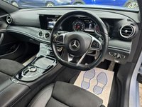 USED 2018 67 MERCEDES-BENZ E-CLASS Silver 2.0 E220d AMG Line Estate, 56,300 miles, 2 owners, Euro 6 ULEZ, Automatic, Bluetooth, Heated Half leather, Sat Nav, Cruise Control, FSH. This 2018 Mercedes Benz E Class E220d AMG Line presents an exceptional opportunity with its remarkably low mileage of just 56,300 miles for its age. This Euro 6 compliant model boasts a powerful yet efficient 2.0 litre diesel engine, delivering an impressive 0-60mph acceleration in only 7.7 seconds. The AMG Line trim ensures a sporty aesthetic and enhanced driving experience, complemented by a generously sized boot, offering practicality for all your needs.  The performance figures for this E Cl