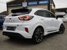 USED 2021 21 FORD PUMA 1.5T EcoBoost ST SUV 5dr Petrol Manual Euro 6 (s/s) (200 ps) Finished in FROZEN WHITE with HEATED RECARO ALCANTARA Trim. This Ford Puma certainly looks the part, it is the sportiest version of the Puma compact SUV, with meaner looks and a racier setup, It's got the raised up driving position, the eye-catching design, and a miniature SUV shape. Features include Sat Nav with Virtual Dash, DAB, B&O Speakers, Heated Sports Reccaro Seats, Heated Steering Wheel,  B/Tooth, Low Mileage and more. Just Dealer serviced at 35653 miles