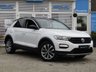 USED 2019 19 VOLKSWAGEN T-ROC 1.0 TSI GPF Design SUV 5dr Petrol Manual Euro 6 (s/s) (115 ps) Finished in PURE WHITE with BLACK ROOF and GREY CLOTH Sports Trim. This T-Roc is for those who want a compact SUV with smart styling and a good level of practicality. This Golf based SUV is both practical and fun to drive. Features include, Low Mileage, Cruise Control, Park Sensors, B/Tooth, Apple Play, Alloys, DAB Radio, Sports Trim and much more. VW Dealer serviced at 13422 miles, 21043 miles and on arrival at 30401 miles.