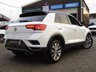 USED 2019 19 VOLKSWAGEN T-ROC 1.0 TSI GPF Design SUV 5dr Petrol Manual Euro 6 (s/s) (115 ps) Finished in PURE WHITE with BLACK ROOF and GREY CLOTH Sports Trim. This T-Roc is for those who want a compact SUV with smart styling and a good level of practicality. This Golf based SUV is both practical and fun to drive. Features include, Cruise Control, B/Tooth, Park Sensors, Apple Play, Alloys, DAB Radio, Sports Trim and much more. VW Dealer serviced at 20084 miles, 27448 miles, 36246 miles, 49833 miles and at 64120 miles on arrival.
