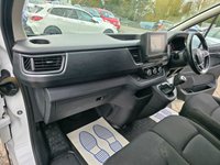 USED 2022 72 RENAULT TRAFIC White 2.0 dCi Blue LL30 Sport Van, 25,000 miles, 1 owner, Euro 6 ULEZ, 6-Speed, Sat Nav, A/C, Parking Sensors, great spec, + VAT @ 20%. This 2022 Renault Trafic presents an exceptional ownership proposition with a remarkably low mileage of just 25,000 miles, having been carefully maintained by a single owner. This dCi Blue LL30 Sport L2 H1 Euro 6 model is powered by an efficient 2.0 litre diesel engine, delivering a robust 148 bhp. It comes equipped with advanced Full LED Headlights featuring distinctive C-Shape Daytime Running Lights, enhancing visibility and the vehicle's modern appearance. For added safety and convenience, it