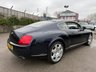 USED 2005 05 BENTLEY CONTINENTAL 6.0 GT Coupe 2dr Petrol Automatic (410 g/km, 552 bhp)-Superb Continental Gt-Finished In Dark Sapphire Metallic-Supplied New By Hr Owen Cheltenham-Main Hide In Magnolia-Secondary Hide In Nautic-Seat Belts & Carpets To Match Secondary Hide-Emblem Stitching-Automatic Headlight Range Adjustment-Climate Control-Cruise Control-Mfsw-Satnav-Dark Stained Burr Walnut-Individual Armrests For Both Front Seats-Heated Front Seats-Diamond Quilted Leather-Keyless Entry-Cd Changer-14 Way Memory Front Electric Seats-Lumbar Support-Rear Fog Lights-Bluetooth-Mulliner Driving Specification-Unmarked 20 Inch Two Piece Alloy Wheels With Matching Pirelli Tyres-16 Services On File. 