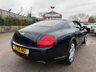 USED 2005 05 BENTLEY CONTINENTAL 6.0 GT Coupe 2dr Petrol Automatic (410 g/km, 552 bhp)-Superb Continental Gt-Finished In Dark Sapphire Metallic-Supplied New By Hr Owen Cheltenham-Main Hide In Magnolia-Secondary Hide In Nautic-Seat Belts & Carpets To Match Secondary Hide-Emblem Stitching-Automatic Headlight Range Adjustment-Climate Control-Cruise Control-Mfsw-Satnav-Dark Stained Burr Walnut-Individual Armrests For Both Front Seats-Heated Front Seats-Diamond Quilted Leather-Keyless Entry-Cd Changer-14 Way Memory Front Electric Seats-Lumbar Support-Rear Fog Lights-Bluetooth-Mulliner Driving Specification-Unmarked 20 Inch Two Piece Alloy Wheels With Matching Pirelli Tyres-16 Services On File. 