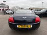 USED 2005 05 BENTLEY CONTINENTAL 6.0 GT Coupe 2dr Petrol Automatic (410 g/km, 552 bhp)-Superb Continental Gt-Finished In Dark Sapphire Metallic-Supplied New By Hr Owen Cheltenham-Main Hide In Magnolia-Secondary Hide In Nautic-Seat Belts & Carpets To Match Secondary Hide-Emblem Stitching-Automatic Headlight Range Adjustment-Climate Control-Cruise Control-Mfsw-Satnav-Dark Stained Burr Walnut-Individual Armrests For Both Front Seats-Heated Front Seats-Diamond Quilted Leather-Keyless Entry-Cd Changer-14 Way Memory Front Electric Seats-Lumbar Support-Rear Fog Lights-Bluetooth-Mulliner Driving Specification-Unmarked 20 Inch Two Piece Alloy Wheels With Matching Pirelli Tyres-16 Services On File. 