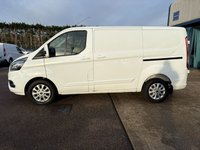 USED 2022 22 FORD TRANSIT CUSTOM Limited L1 H1 2.0 280 EcoBlue SWB Diesel Panel Van AUTO Euro 6 (s/s) (130 bhp) Only 80,486 miles - Last service on 19.08.2025 @ 75,183 miles - EURO 6, A/C, SATNAV, reversing camera, front & rear parking sensors, heated seats, alloys, heated screen, cruise control, Bluetooth, electric power folding mirrors, E/W, DAB Radio with Apple car play, USB port, start/stop, factory fitted bulkhead, colour coded, auto headlights, side loading door, ply lined, front fog lights, remote Central Locking, spare key, finance arranged on site & 6 months premium AutoGuard warranty