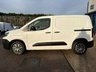 USED 2022 72 PEUGEOT PARTNER Professional Premium L1 1.5 BlueHDi 1000 SWB Diesel Panel Van Manual Euro 6 (s/s) (100 bhp) 2 services - last service 16.01.2026 - Only 80,735 miles - EURO 6 (ULEZ compliant) - Built in 8" touchscreen SATNAV with DAB radion & apple car play, A/C, E/W, Bluetooth, 3 seats, front fog lights, full bulkhead, ply lined, driver's airbag, side loading door, remote central Locking, Alarm, USB port, steering column radio control, barn rear doors, racking (can be removed), spare key, finance arranged on site & 6 months premium Autoguard warranty.