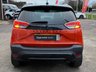 USED 2022 22 VAUXHALL CROSSLAND 1.2 Turbo Ultimate SUV 5dr Petrol Manual Euro 6 (s/s) (130 ps) Finished in  POWER ORANGE MET with DARK GREY PART ALCANTARA TRIM. The Crossland is a spacious, practical, and economical family car. It represents a good-value, well-equipped family car that's easy to drive and cheap to run. Features include,  17" Alloy Wheels, Cruise Control, DAB Radio, Rear Camera, Parking Sensors, Black Roof, and much more. Dealer serviced at 5748 miles, 8789 miles and on arrival at 11589 miles.