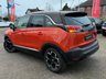 USED 2022 22 VAUXHALL CROSSLAND 1.2 Turbo Ultimate SUV 5dr Petrol Manual Euro 6 (s/s) (130 ps) Finished in  POWER ORANGE MET with DARK GREY PART ALCANTARA TRIM. The Crossland is a spacious, practical, and economical family car. It represents a good-value, well-equipped family car that's easy to drive and cheap to run. Features include,  17" Alloy Wheels, Cruise Control, DAB Radio, Rear Camera, Parking Sensors, Black Roof, and much more. Dealer serviced at 5748 miles, 8789 miles and on arrival at 11589 miles.
