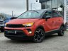USED 2022 22 VAUXHALL CROSSLAND 1.2 Turbo Ultimate SUV 5dr Petrol Manual Euro 6 (s/s) (130 ps) Finished in  POWER ORANGE MET with DARK GREY PART ALCANTARA TRIM. The Crossland is a spacious, practical, and economical family car. It represents a good-value, well-equipped family car that's easy to drive and cheap to run. Features include,  17" Alloy Wheels, Cruise Control, DAB Radio, Rear Camera, Parking Sensors, Black Roof, and much more. Dealer serviced at 5748 miles, 8789 miles and on arrival at 11589 miles.