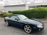 USED 2001 Y JAGUAR XKR 	4.0 Convertible 2dr Petrol Automatic (269 g/km, 370 bhp)-3 Former Keepers-Superb Low Mileage Example-Finished In Emerald Green Metallic-Heated Ivory Leather Upholstery-Walnut Dash-Climate Control-20 Inch Split Rim Alloy Wheels-Ivory Tonneau Cover-Ready For That European Road Trip. 