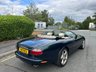 USED 2001 Y JAGUAR XKR 	4.0 Convertible 2dr Petrol Automatic (269 g/km, 370 bhp)-3 Former Keepers-Superb Low Mileage Example-Finished In Emerald Green Metallic-Heated Ivory Leather Upholstery-Walnut Dash-Climate Control-20 Inch Split Rim Alloy Wheels-Ivory Tonneau Cover-Ready For That European Road Trip. 