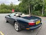 USED 2001 Y JAGUAR XKR 	4.0 Convertible 2dr Petrol Automatic (269 g/km, 370 bhp)-3 Former Keepers-Superb Low Mileage Example-Finished In Emerald Green Metallic-Heated Ivory Leather Upholstery-Walnut Dash-Climate Control-20 Inch Split Rim Alloy Wheels-Ivory Tonneau Cover-Ready For That European Road Trip. 