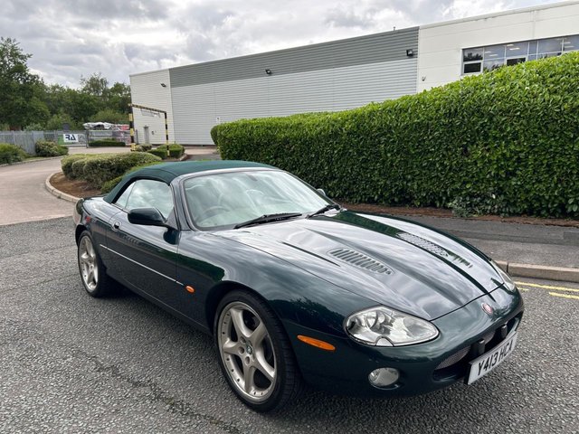 2001 Y Jaguar Xkr 	4.0 Convertible 2dr Petrol Automatic (269 g/km, 370 bhp)-3 Former Keepers-Superb Low Mileage Example-Finished In Emerald Green Metallic-Heated Ivory Leather Upholstery-Walnut Dash-Climate Control-20 Inch Split Rim Alloy Wheels-Ivory Tonneau Cover-Ready For That European Road Trip.