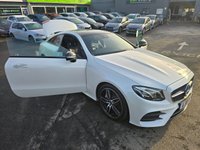 USED 2018 18 MERCEDES-BENZ E-CLASS Mercedes E300 AMG Line Premium Plus Coupe, 69,900 miles, Automatic, Leather, Sat Nav, Reverse Camera, Heated Seats, 19in Alloys, ULEZ compliant. This 2018 Mercedes Benz E Class E300 AMG Line (Premium Plus) boasts a remarkable history with only two previous owners, boasts a full dealership service history, with its last service completed on 3rd January 2025 at 61,807 miles offering a unique opportunity to acquire a well cared for example.  This sophisticated saloon features a powerful yet efficient 2.0 litre petrol engine, meeting Euro 6 emissions standards.  The AMG Line trim enhances its sporty appeal, complemented by the desirable Nigh