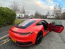 USED 2019 19 PORSCHE 911 3.0T 992 Carrera 4S Coupe 2dr Petrol PDK 4WD Euro 6 (s/s) (450 ps)-Factory Extras Worth �&pound;9,027-1 Owner From New-Finished In Lava Orange-Bordeaux Red Two Tone Leather Upholstery-Sport Design Sideskirts-Porsche Logo Painted In High Gloss Black-Privacy Glass-Electric Folding Exterior Mirrors-Sports Exhaust System In Black-20-21 Inch Carrera S Alloy Wheels In Gloss Black-Automatic Dimming Interior & Exterior Mirrors-Front & Rear Park Assist With Reversing Camera-Porsche Entry & Drive-Homelink-Gt Sport Heated Steering Wheel In Leather-4 Way Electric Sports Seats-Bose Surround Sound System-A Real One Off 992. 