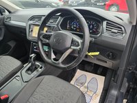 USED 2022 22 VOLKSWAGEN TIGUAN 1.4 TSI Life Plug-in Hybrid SUV Automatic in Grey with 63,500 miles, Euro 6, Adaptive cruise, Sat Nav, Front and Rear sensors and Reverse camera. This 2022 Volkswagen Tiguan TSI Life offers peace of mind with a 12 month MOT provided on purchase and a 3 month warranty.  This Euro 6 compliant, 1.4 litre petrol plug in hybrid is presented in the Life trim.  It comes equipped with a useful rear view camera that includes parking assistance, and for your comfort, it features 3 zone electronic climate control with independent rear air conditioning.  Long journeys are made easier with adaptive cruise control, and you can stay connected and entert