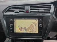 USED 2022 22 VOLKSWAGEN TIGUAN 1.4 TSI Life Plug-in Hybrid SUV Automatic in Grey with 63,500 miles, Euro 6, Adaptive cruise, Sat Nav, Front and Rear sensors and Reverse camera. This 2022 Volkswagen Tiguan TSI Life offers peace of mind with a 12 month MOT provided on purchase and a 3 month warranty.  This Euro 6 compliant, 1.4 litre petrol plug in hybrid is presented in the Life trim.  It comes equipped with a useful rear view camera that includes parking assistance, and for your comfort, it features 3 zone electronic climate control with independent rear air conditioning.  Long journeys are made easier with adaptive cruise control, and you can stay connected and entert