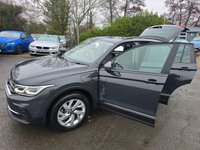USED 2022 22 VOLKSWAGEN TIGUAN 1.4 TSI Life Plug-in Hybrid SUV Automatic in Grey with 63,500 miles, Euro 6, Adaptive cruise, Sat Nav, Front and Rear sensors and Reverse camera. This 2022 Volkswagen Tiguan TSI Life offers peace of mind with a 12 month MOT provided on purchase and a 3 month warranty.  This Euro 6 compliant, 1.4 litre petrol plug in hybrid is presented in the Life trim.  It comes equipped with a useful rear view camera that includes parking assistance, and for your comfort, it features 3 zone electronic climate control with independent rear air conditioning.  Long journeys are made easier with adaptive cruise control, and you can stay connected and entert