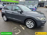 USED 2022 22 VOLKSWAGEN TIGUAN 1.4 TSI Life Plug-in Hybrid SUV Automatic in Grey with 63,500 miles, Euro 6, Adaptive cruise, Sat Nav, Front and Rear sensors and Reverse camera. This 2022 Volkswagen Tiguan TSI Life offers peace of mind with a 12 month MOT provided on purchase and a 3 month warranty.  This Euro 6 compliant, 1.4 litre petrol plug in hybrid is presented in the Life trim.  It comes equipped with a useful rear view camera that includes parking assistance, and for your comfort, it features 3 zone electronic climate control with independent rear air conditioning.  Long journeys are made easier with adaptive cruise control, and you can stay connected and entert