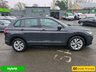 USED 2022 22 VOLKSWAGEN TIGUAN 1.4 TSI Life Plug-in Hybrid SUV Automatic in Grey with 63,500 miles, Euro 6, Adaptive cruise, Sat Nav, Front and Rear sensors and Reverse camera. This 2022 Volkswagen Tiguan TSI Life offers peace of mind with a 12 month MOT provided on purchase and a 3 month warranty.  This Euro 6 compliant, 1.4 litre petrol plug in hybrid is presented in the Life trim.  It comes equipped with a useful rear view camera that includes parking assistance, and for your comfort, it features 3 zone electronic climate control with independent rear air conditioning.  Long journeys are made easier with adaptive cruise control, and you can stay connected and entert