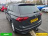 USED 2022 22 VOLKSWAGEN TIGUAN 1.4 TSI Life Plug-in Hybrid SUV Automatic in Grey with 63,500 miles, Euro 6, Adaptive cruise, Sat Nav, Front and Rear sensors and Reverse camera. This 2022 Volkswagen Tiguan TSI Life offers peace of mind with a 12 month MOT provided on purchase and a 3 month warranty.  This Euro 6 compliant, 1.4 litre petrol plug in hybrid is presented in the Life trim.  It comes equipped with a useful rear view camera that includes parking assistance, and for your comfort, it features 3 zone electronic climate control with independent rear air conditioning.  Long journeys are made easier with adaptive cruise control, and you can stay connected and entert